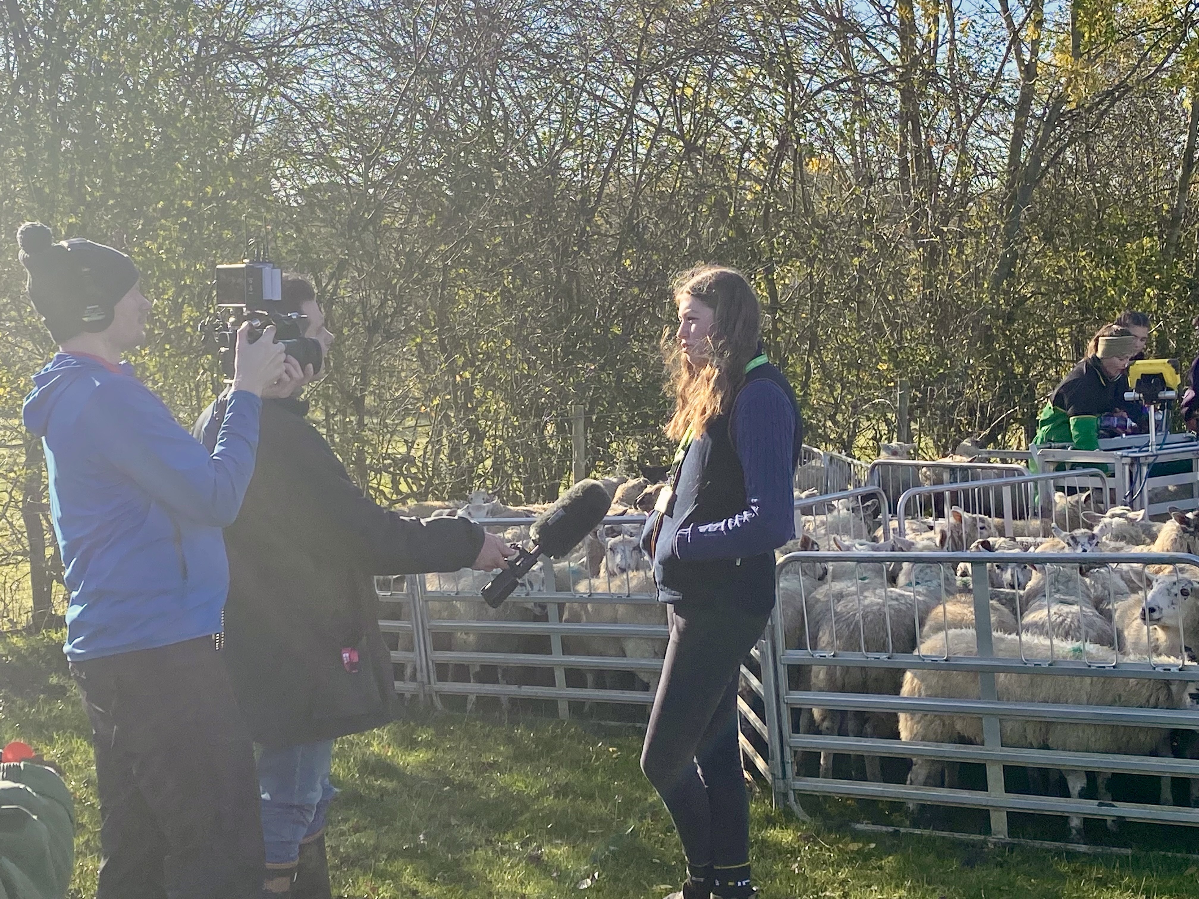 Media interviewing agriculture student